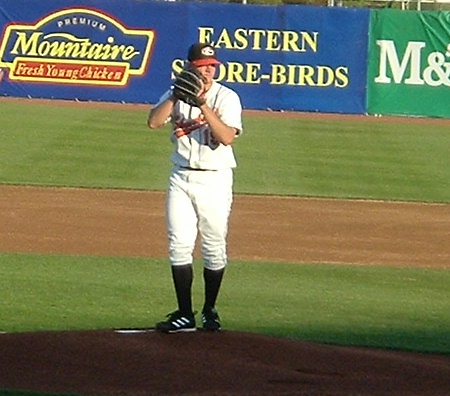 Delmarva pitcher Chorye Spoone begins to deliver a pitch in a May 3rd contest against Lakewood.